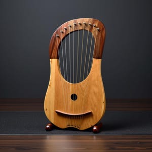May include: A wooden lyre with a light brown body and a dark brown arched top. The instrument has strings stretched across the sound hole and a small, round sound hole. The lyre is supported by two small, brown feet.