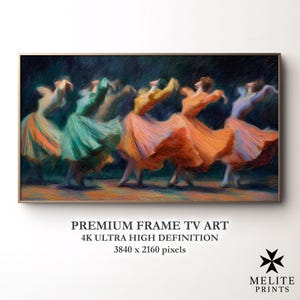 May include: A framed print depicting a group of dancers in a dynamic pose, with a painterly aesthetic. The dancers are dressed in flowing gowns of orange, green, and yellow hues. The artwork is labelled "PREMIUM FRAME TV ART" with "4K ULTRA HIGH DEFINITION".
