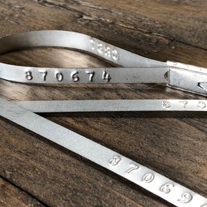 LOT of 5 - Stamped Numbered Metal Seal Strap New Old Stock - Steampunk Permanent Loop Number Numbers Group Security Crafts Supplies Lock