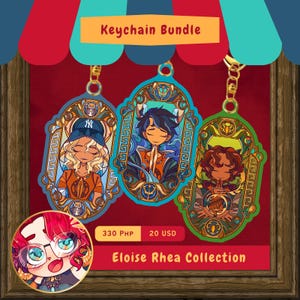 Puede incluir: Un conjunto de llaveros con tres colgantes ilustrados, cada uno con un marco y un llavero dorados. Cada colgante muestra un diseño de personaje diferente con una combinación de colores única. El texto "Keychain Bundle" está en la parte superior. El texto "Eloise Rhea Collection" está en la parte inferior.