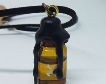 Poison bottle necklace