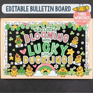 May include: A wooden bulletin board with a black background and the words "Our Class is Blooming with Lucky Little Ducklings." The board features cartoon ducklings, shamrocks, and a rainbow. Text at the top reads "Editable Bulletin Board."