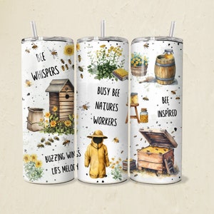 May include: Three white stainless steel tumblers with bee-themed designs. The first tumbler features a beehive, a bag of pollen, and the text "Bee Whispers, Buzzing Wings, Life's Melody". The second tumbler features a beekeeper, a beehive, and the text "Busy Bee, Nature's Workers". The third tumbler features a honey jar, a barrel of honey, and the text "Bee Inspired".