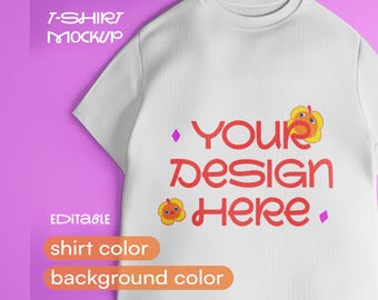 May include: White t-shirt mockup with the text "YOUR DESIGN HERE" in red, along with a small flower graphic. The words "T-SHIRT MOCKUP" and "EDITABLE" are also visible. The background is a gradient of purple and orange.