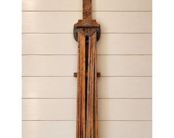 Antique "Perfection" wall-mounted folding clothes drier. 8 extending arms
