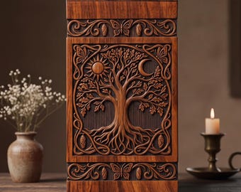 May include: A rectangular wooden urn featuring intricate carvings of a central tree with deep roots, a sun, a crescent moon, and butterflies. The dark wood grain is visible throughout the piece, which is framed by decorative borders containing chrysalis motifs.
