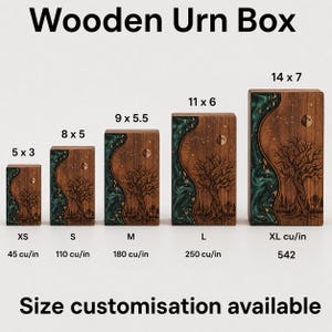 May include: Five rectangular wooden urn boxes in sizes XS, S, M, L, and XL, labeled with dimensions in inches and capacities in cubic inches. Each box features a dark wood grain, a green resin river inlay, and a laser-engraved tree and moon design.