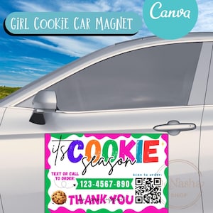 Puede incluir: Un imán rectangular para coche con el texto "GIRL COOKIE CAR MAGNET" en la parte superior. El imán tiene un diseño colorido con las palabras "it's COOKIE season" y un número de teléfono. También se incluye un código QR.
