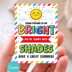 May include: A colorful card with a cheerful sun illustration and the text "Your future is so bright, you're gonna need shades. Have a great summer!" The card has a rainbow border and is held in a hand.