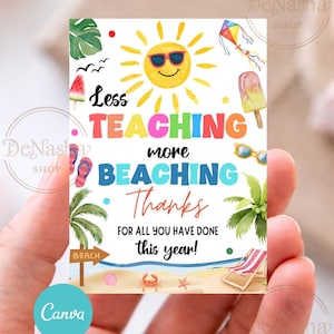 May include: A colorful card with a beach theme, featuring a smiling sun wearing sunglasses, a kite, and an ice pop. Text reads "Less Teaching more Beaching Thanks for all you have done this year!" The card is held in a hand.