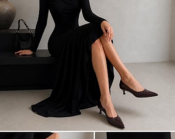 Décolleté eleganti con punta affusolata e tacco sottile, perfette da indossare in ufficio o per le feste.