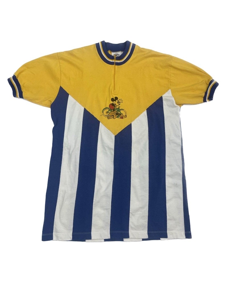 May include: A yellow and blue striped cycling jersey with a half-zip closure. The jersey features a cartoon image of Mickey Mouse riding a bicycle.