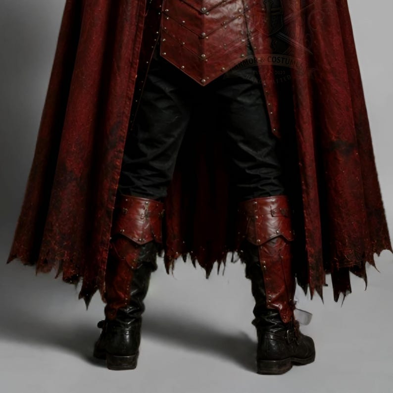 Men's leather pirate costume in dark red and black, featuring a detailed leather vest, layered shoulder armor, arm bracers, leg armor, and flowing cape. Handmade pirate cosplay outfit for Halloween, LARP, Renaissance fairs, medieval fantasy events, themed parties, festivals, conventions, stage performances, and photoshoots. Custom sizing, colors, length, and design options available. Dark fantasy pirate captain costume with wearable leather armor and handcrafted details.