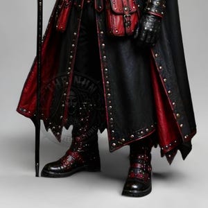 Black leather plague doctor costume coat with gothic and steampunk styling, red leather details, layered shoulder armor, straps, rivets, long sleeves, gloves and matching bracers. Dark fantasy medieval inspired cosplay outfit for Halloween, LARP, Renaissance fairs, photoshoots, festivals and costume parties. Handmade leather outerwear with a dramatic plague doctor aesthetic and customizable fit. Hat, plague doctor mask, bags, staff and accessories are not included and can be ordered separately.!