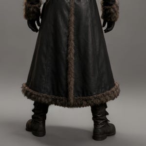 Black leather plague doctor coat with a dramatic fur-trimmed hood, shoulders, cuffs, front edges, and hem. Long medieval-inspired silhouette with lace-up front, wide adjustable leather belt, fitted sleeves, and dark gothic styling. Ideal for plague doctor cosplay, Halloween costume, LARP, Renaissance fairs, medieval festivals, fantasy events, gothic photoshoots, theatrical performances, and themed parties. Handmade leather costume coat with custom sizing available for a personalized fit.