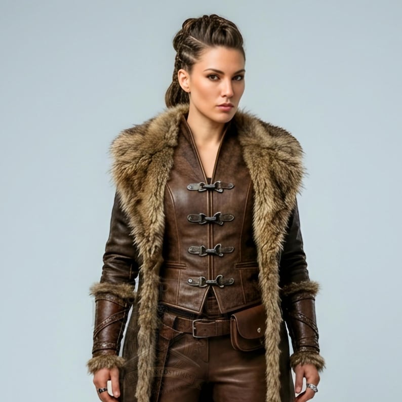 Women’s brown Viking leather fur coat costume featuring a dramatic fur-trimmed collar, long medieval warrior silhouette, fitted waist, front metal closures, leather belt, matching pants, wrist guards, and lace-up boots. Handmade Shieldmaiden-inspired outfit for Halloween, Viking cosplay, LARP events, Renaissance fairs, medieval festivals, fantasy conventions, Norse-themed parties, winter events, stage performances, warrior photoshoots, and custom made-to-measure costume styling for cosplay fans