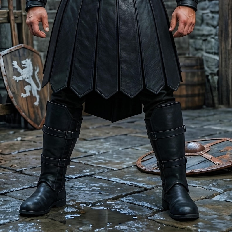Men’s black Viking leather armor costume with layered chest panels, dramatic black fur shoulder trim, double buckle waist belts, segmented leather battle skirt, matching forearm bracers, and black leg armor. Full front view shows a dark Norse warrior outfit with structured leather detailing and rugged medieval styling. Ideal for Viking cosplay, medieval LARP, Renaissance fairs, Halloween, fantasy conventions, warrior costumes, stage events, and themed photoshoots.