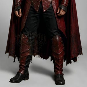 Men's leather pirate costume in dark red and black, featuring a detailed leather vest, layered shoulder armor, arm bracers, leg armor, and flowing cape. Handmade pirate cosplay outfit for Halloween, LARP, Renaissance fairs, medieval fantasy events, themed parties, festivals, conventions, stage performances, and photoshoots. Custom sizing, colors, length, and design options available. Dark fantasy pirate captain costume with wearable leather armor and handcrafted details.