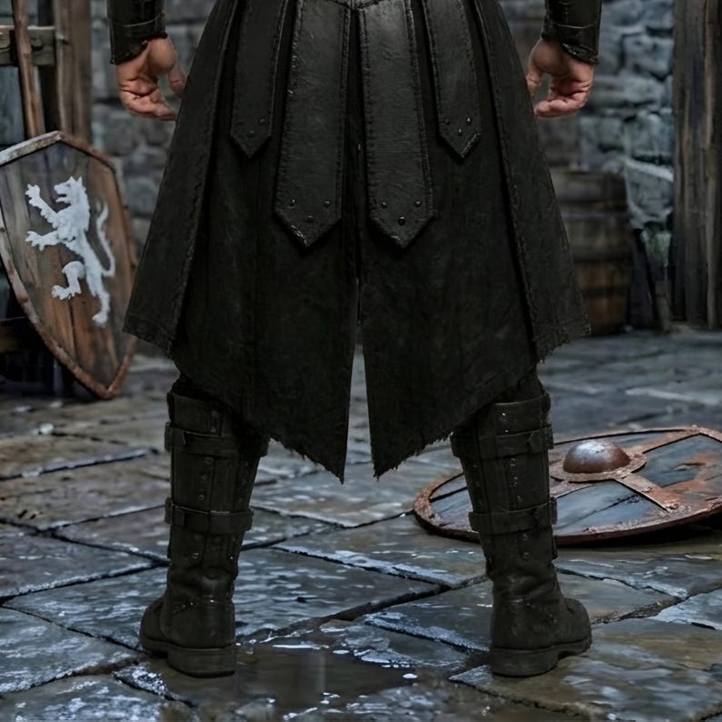 Men’s black Viking leather armor costume with layered chest panels, dramatic black fur shoulder trim, double buckle waist belts, segmented leather battle skirt, matching forearm bracers, and black leg armor. Full front view shows a dark Norse warrior outfit with structured leather detailing and rugged medieval styling. Ideal for Viking cosplay, medieval LARP, Renaissance fairs, Halloween, fantasy conventions, warrior costumes, stage events, and themed photoshoots.