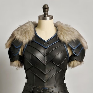womens medieval leather armor, genuine leather cosplay set, dragon print chestplate, fur shoulder armor, blue trim armor dress, LARP viking warrior outfits, renaissance faire costume, fantasy armor for women, black leather body armor, adjustable buckle armor, handmade leather costume, gothic knight cosplay, historical reenactment gear, stage and theater armor, photography armor, custom size leather armor, dragon emblem armor, warrior queen outfit, faux fur shoulder pauldrons, layered skirt armor