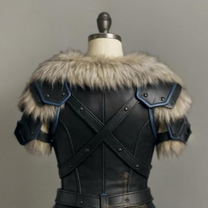 womens medieval leather armor, genuine leather cosplay set, dragon print chestplate, fur shoulder armor, blue trim armor dress, LARP viking warrior outfits, renaissance faire costume, fantasy armor for women, black leather body armor, adjustable buckle armor, handmade leather costume, gothic knight cosplay, historical reenactment gear, stage and theater armor, photography armor, custom size leather armor, dragon emblem armor, warrior queen outfit, faux fur shoulder pauldrons, layered skirt armor