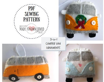 May include: A PDF sewing pattern for 3-in-1 camper van ornaments. The image displays three felt camper van designs in orange, white, and light blue, featuring stitched details, white button accents, and a small green holiday wreath.