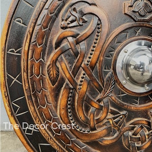 Handcrafted Shield


Shield With Dragons


Shield Wall Decor
Celtic Shield Golden
Traditional Viking Shield
Viking Shield 840 X840 Pic
Celtic Shield Woody
Viking Shield & Axe
Ceremonial Viking Shield
Norse Viking Molding
Viking Shield Maiden Decal
28 Viking Shield
Viking Shield Table
Larp Medieval Shield
Viking Devil Shield
Medieval Warrior Shield
Viking Sheild
Carved Viking Shield
Viking Anniversary Wood
Viking Shields 3d Print
Handmade Viking Shield
Viking Hanging Mural
Shield and Sword Wall