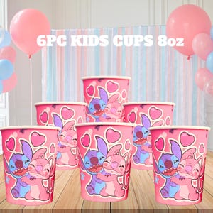 May include: Six pink paper cups with a cartoon design of two characters hugging, surrounded by hearts. The cups are labeled "6PC KIDS CUPS 8oz". The cups are decorated with a cartoon design of two characters hugging, surrounded by hearts.