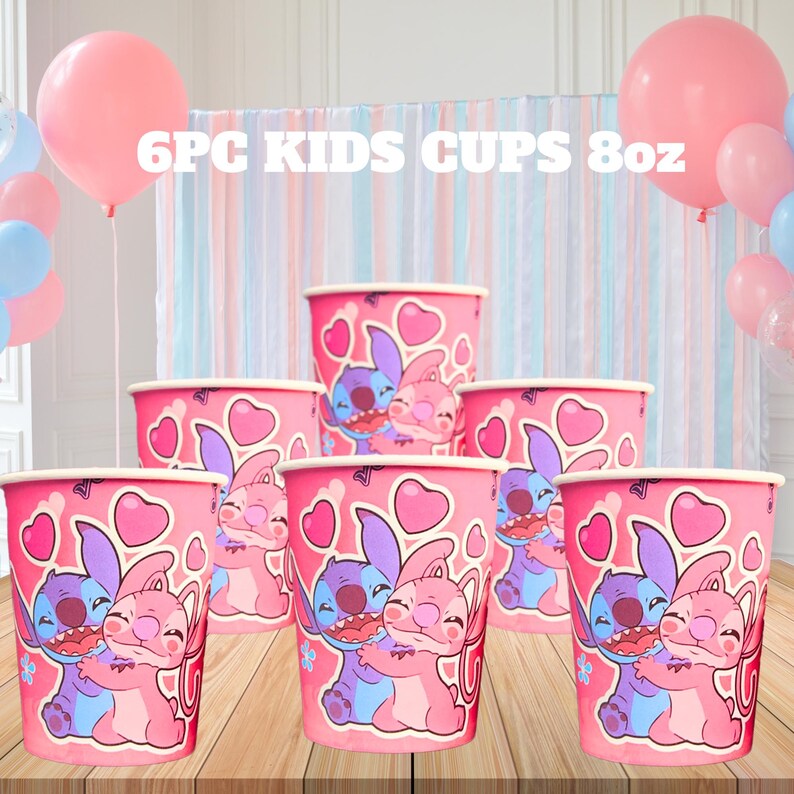 May include: Six pink paper cups with a cartoon design of two characters hugging, surrounded by hearts. The cups are labeled "6PC KIDS CUPS 8oz". The cups are decorated with a cartoon design of two characters hugging, surrounded by hearts.