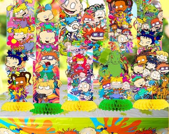 May include: A set of party decorations featuring cartoon characters. The set includes six vertical swirls and cutouts, each adorned with colorful illustrations of the characters. The decorations are placed on a table with a matching tablecloth, and yellow and green honeycomb centerpieces.