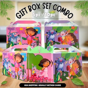 May include: A set of five colorful cardboard gift boxes featuring cartoon characters including a girl with brown hair, a monkey, and a blue bull. The boxes are decorated with flowers, green foliage, and clouds. The text GIFT BOX SET COMBO 5pc / 10pc is printed above the boxes.