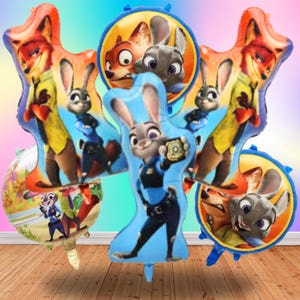 May include: A selection of Zootopia-themed foil balloons in various shapes. The balloons feature Judy Hopps, Nick Wilde, and other characters from the animated film. These colourful balloons are ideal for a Zootopia-themed party or celebration.