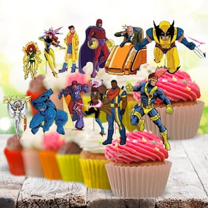 May include: Cupcakes with pink frosting and colorful sprinkles, topped with various X-Men character cutouts. The cupcakes are in paper liners and arranged on a wooden surface, creating a festive and themed dessert.