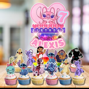 May include: A collection of cupcakes with character toppers, including Stitch and Angel, arranged on a wooden surface. A large pink heart-shaped topper with the number 7 and the name "Alexis" is also present. The words "Happy Birthday" are displayed.