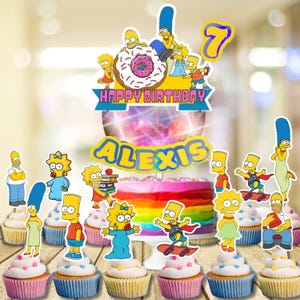 May include: A colorful birthday cake and cupcakes featuring The Simpsons characters. The cake has a rainbow design and a topper that says "Happy Birthday Alexis" and a number 7. Cupcakes are decorated with The Simpsons characters.