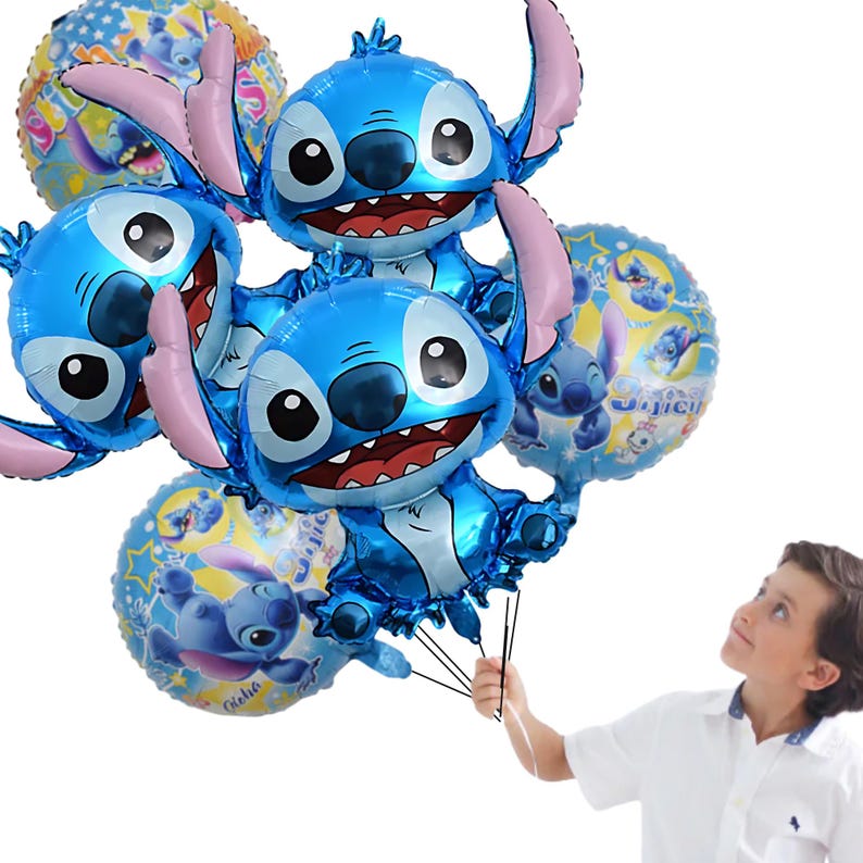 May include: A cluster of blue foil balloons shaped like the character Stitch, with pink ears and a wide grin. Several round balloons with Stitch graphics are also present. The balloons are held by a person.