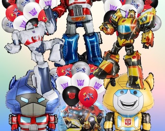 May include: A selection of Transformers-themed balloons, featuring large character inflatables of Optimus Prime, Bumblebee, and others. The balloons are red, blue, yellow, and silver, with various Transformers logos and designs. Ideal for a party or themed event.