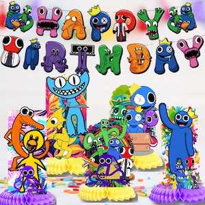 May include: A colorful birthday party decoration set featuring cartoon characters and the words "HAPPY BIRTHDAY." The decorations include various character cutouts, honeycomb centerpieces, and a banner with the birthday message.