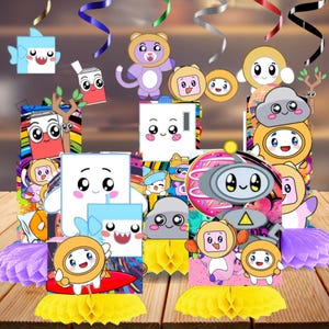 May include: A collection of colorful cartoon character decorations, including a shark, bear, cloud, and robot, with various shapes and designs. The decorations are arranged on a wooden surface with honeycomb centerpieces and colorful streamers, suitable for a party or celebration.