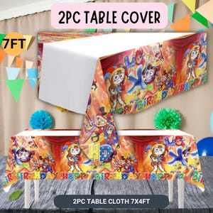 May include: A 2-piece rectangular table cover set measuring 7 feet by 4 feet, featuring a colorful cartoon character print with jester-themed figures, red curtains, and the text HAPPY BIRTHDAY in bold, multi-colored block letters on a vibrant background.