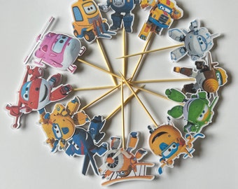 May include: A set of 12 colorful cartoon character cupcake toppers featuring characters from the animated series Super Wings. The toppers are printed on cardstock and attached to wooden skewers.