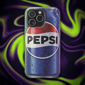 May include: A smartphone case featuring a blue, white, and red Pepsi logo graphic with a condensation effect of water droplets across the surface. The design mimics the appearance of a cold soda can, complete with a camera cutout in the upper corner.