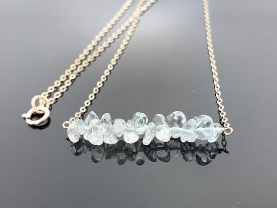 Pendentif pierre de lune arc-en-ciel : bijoux en argent sterling et topaze bleue - France