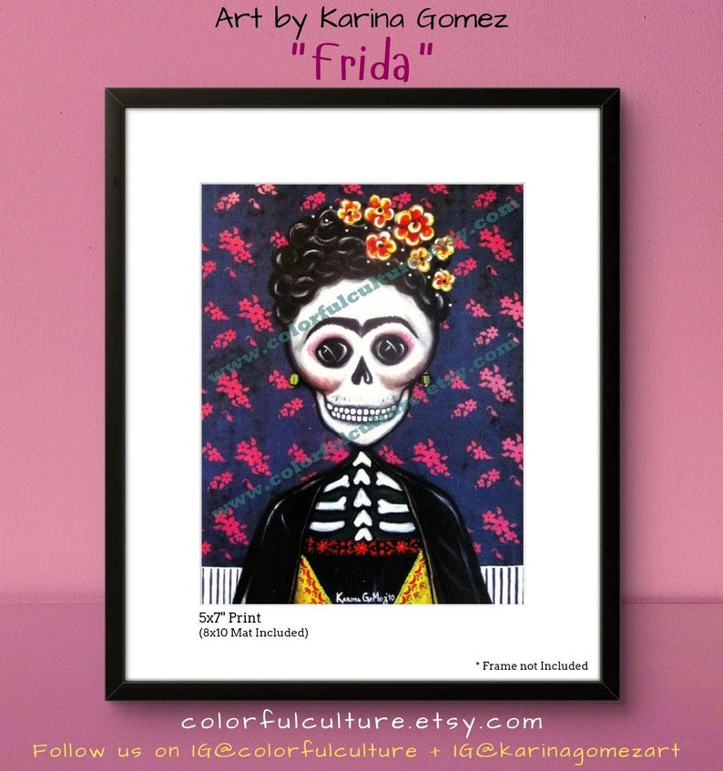 May include: A 5x7 inch print of a colorful illustration of Frida Kahlo as a skeleton with a floral crown. The background is a dark blue with pink and white flowers. The print includes an 8x10 inch mat.