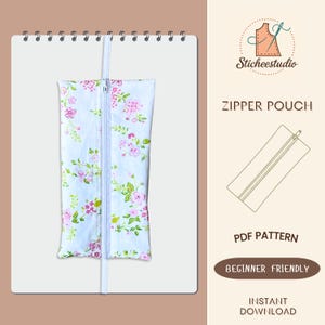 May include: A floral print zipper pouch with a white zipper and a white strap. The pouch is light blue with pink and green floral patterns. The image also includes the text "Zipper Pouch", "PDF Pattern", "Beginner Friendly", and "Instant Download".