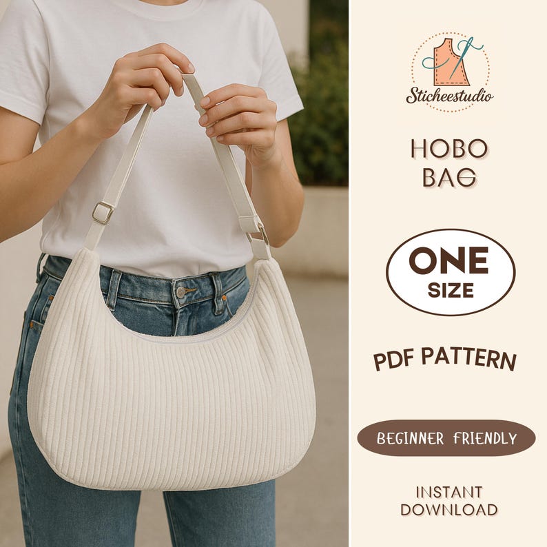 May include: Cream-colored hobo bag with a corduroy texture, held by a person wearing a white t-shirt and blue jeans. The bag has a long, adjustable strap and a silver-colored buckle. The text on the image says "Hobo Bag", "One Size", "PDF Pattern", "Beginner Friendly", and "Instant Download".