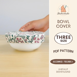 May include: A white ceramic bowl covered with a floral patterned fabric bowl cover. The cover features pink and green flowers on a cream background. The image also includes text that reads "Bowl Cover", "Three Size", "PDF Pattern", "Beginner Friendly", and "Instant Download".