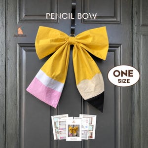 May include: A large fabric bow shaped like a pencil, featuring a yellow body, a white band, a pink eraser end, and a tan wood-colored tip with a black lead point. The text PENCIL BOW and ONE SIZE are visible, along with instructional paper sheets.