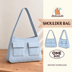 May include: A shoulder bag featuring a light blue and white vertical striped pattern with two front pockets and a single shoulder strap. The image includes the text Sticheestudio, SHOULDER BAG, and ONE SIZE, along with two technical line drawings of the bag.