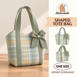 May include: A tote bag featuring a light blue, yellow, and white plaid pattern with solid sage green fabric handles and a matching bow accent. The image includes the text Sticheestudio, SHAPED TOTE BAG, and ONE SIZE, along with two technical line drawings.